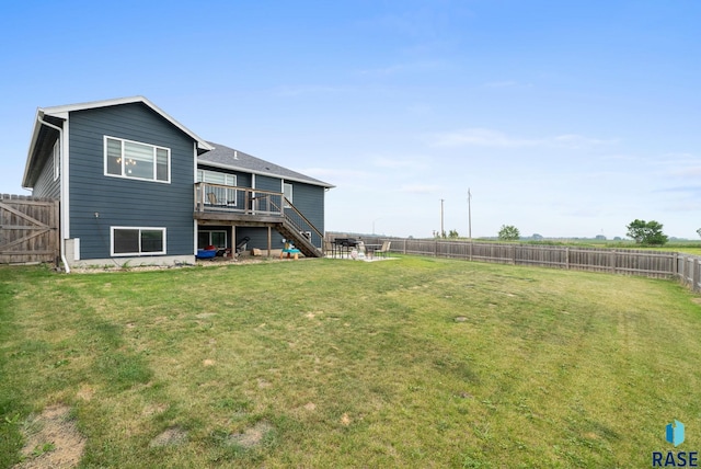 7513 E 49th St, Sioux Falls, SD 57110 - back of house with a wooden deck, stairs, and a fenced backyard
