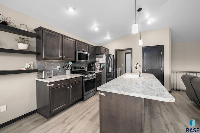 7513 E 49th St, Sioux Falls, SD 57110 - kitchen featuring appliances with stainless steel finishes, open shelves, dark brown cabinetry, light wood-style flooring, and vaulted ceiling