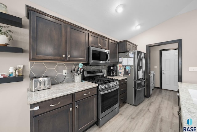 7513 E 49th St, Sioux Falls, SD 57110 - kitchen featuring stainless steel appliances, washing machine and dryer, dark brown cabinets, tasteful backsplash, and open shelves