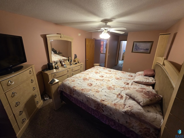 3333 W Ralph Rogers Rd, Sioux Falls, SD 57108 - bedroom featuring a textured ceiling, ceiling fan, and dark carpet