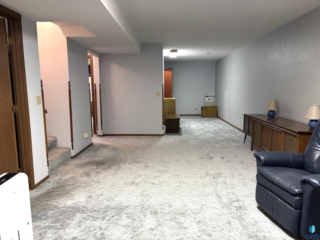 421 E 2nd St, Miller, SD 57362 - living area featuring carpet floors and stairway