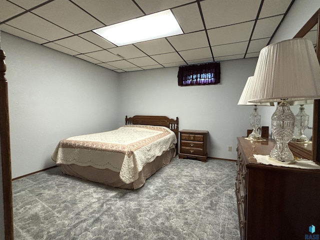 421 E 2nd St, Miller, SD 57362 - carpeted bedroom with baseboards and a paneled ceiling