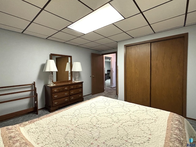 421 E 2nd St, Miller, SD 57362 - carpeted bedroom with a closet and a drop ceiling