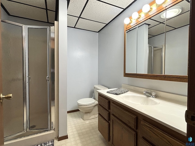 421 E 2nd St, Miller, SD 57362 - full bath with a stall shower, vanity, a drop ceiling, and tile patterned floors