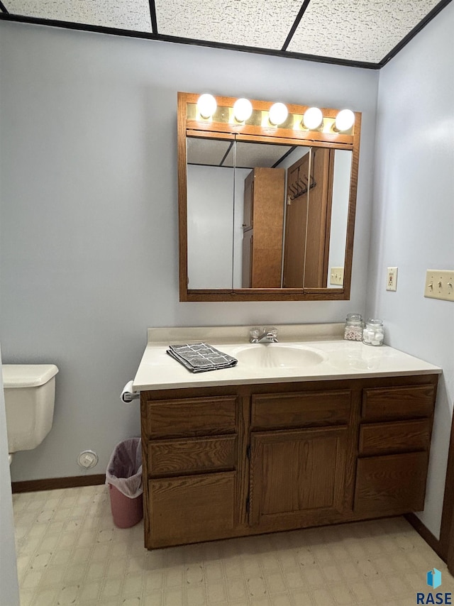 421 E 2nd St, Miller, SD 57362 - bathroom featuring vanity and tile patterned floors