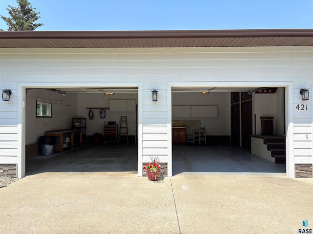 421 E 2nd St, Miller, SD 57362 - garage with concrete driveway