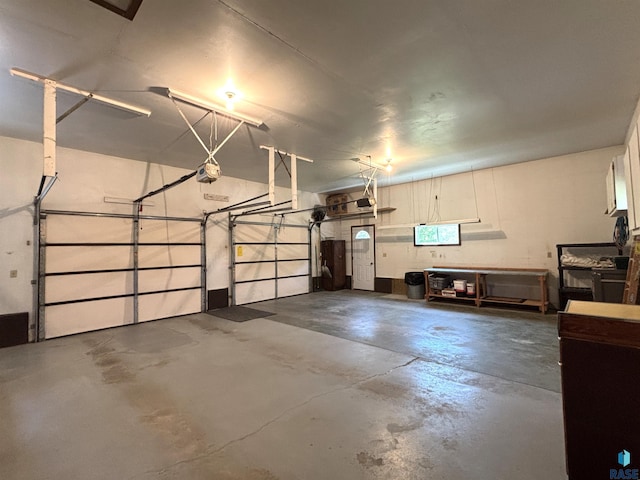 421 E 2nd St, Miller, SD 57362 - garage featuring a garage door opener