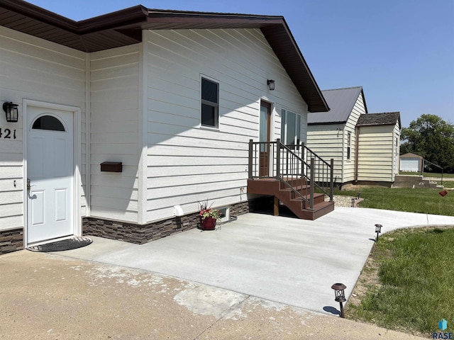421 E 2nd St, Miller, SD 57362 - exterior space with a patio