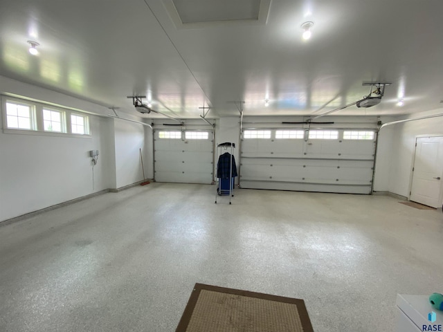 8617 W Bryggen Ct, Sioux Falls, SD 57107 - garage featuring a garage door opener