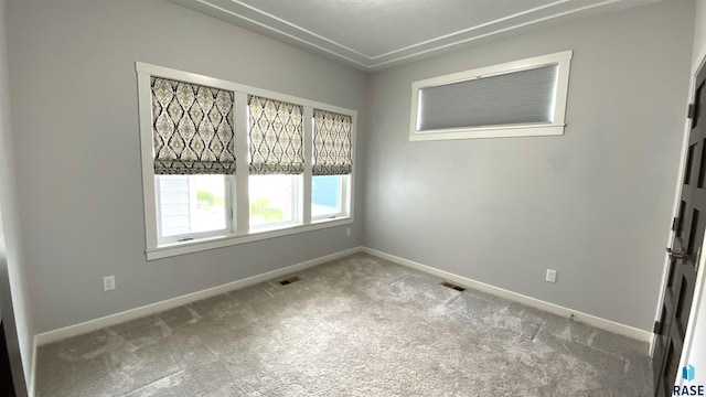 8617 W Bryggen Ct, Sioux Falls, SD 57107 - spare room with carpet floors and baseboards