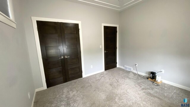 8617 W Bryggen Ct, Sioux Falls, SD 57107 - unfurnished bedroom with carpet flooring and baseboards