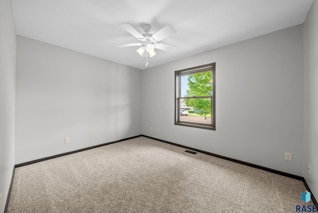 301 W 6th St, Crooks, SD 57020 - carpeted spare room with baseboards and ceiling fan