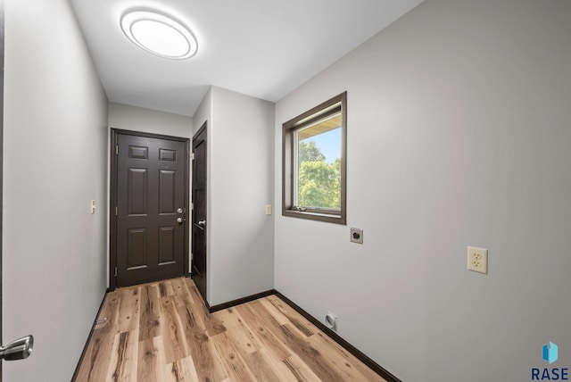 301 W 6th St, Crooks, SD 57020 - entryway featuring light wood-type flooring and baseboards