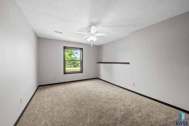 301 W 6th St, Crooks, SD 57020 - carpeted empty room with ceiling fan and baseboards