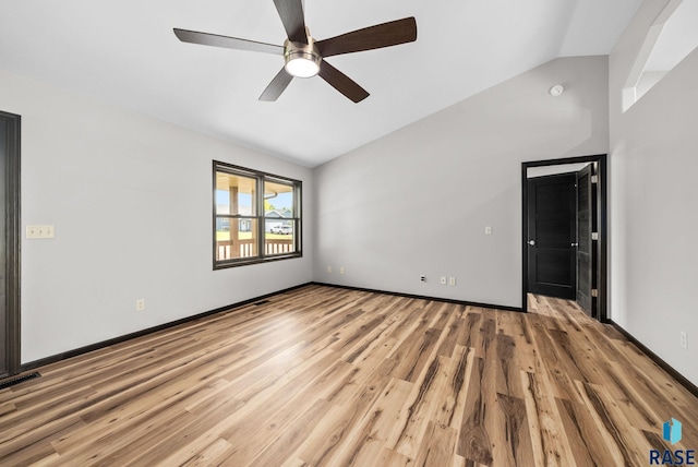 301 W 6th St, Crooks, SD 57020 - unfurnished room featuring vaulted ceiling, light wood-style flooring, ceiling fan, and a smoke detector