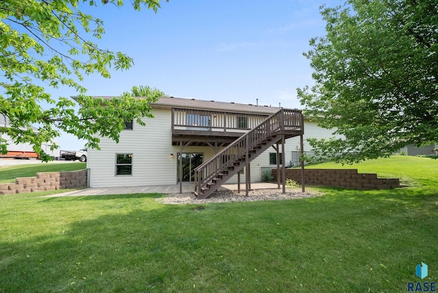 301 W 6th St, Crooks, SD 57020 - back of house featuring stairway, a patio area, a wooden deck, and a yard