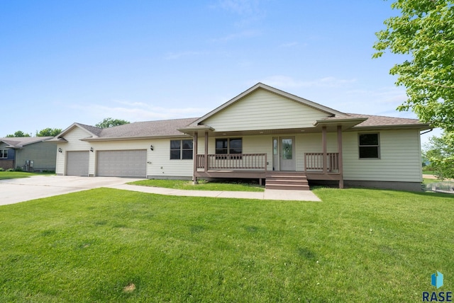 301 W 6th St, Crooks, SD 57020 - ranch-style home with covered porch, an attached garage, concrete driveway, a front lawn, and roof with shingles