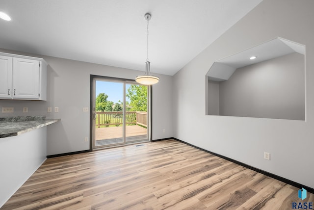 301 W 6th St, Crooks, SD 57020 - unfurnished dining area with light wood finished floors and recessed lighting