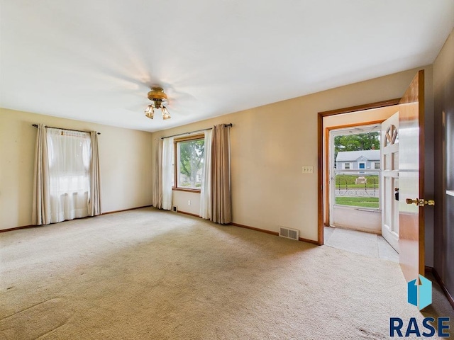 1721 W 11th St, Sioux Falls, SD 57104 - empty room featuring light carpet