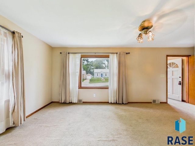 1721 W 11th St, Sioux Falls, SD 57104 - carpeted spare room with baseboards