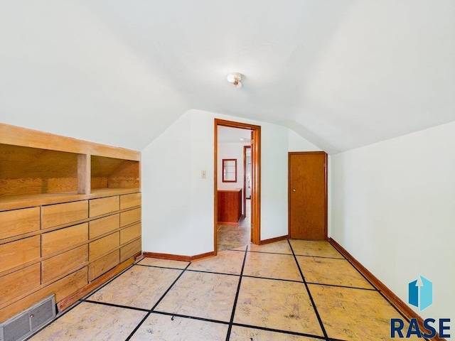 1721 W 11th St, Sioux Falls, SD 57104 - bonus room featuring lofted ceiling and light tile patterned floors