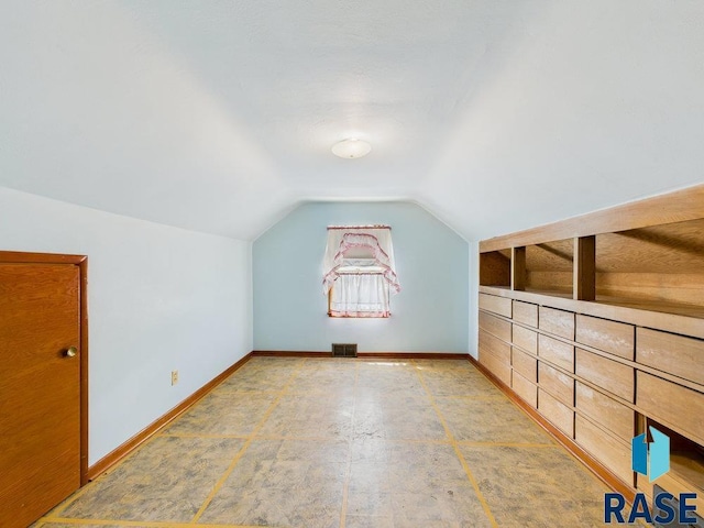 1721 W 11th St, Sioux Falls, SD 57104 - bonus room featuring lofted ceiling and baseboards