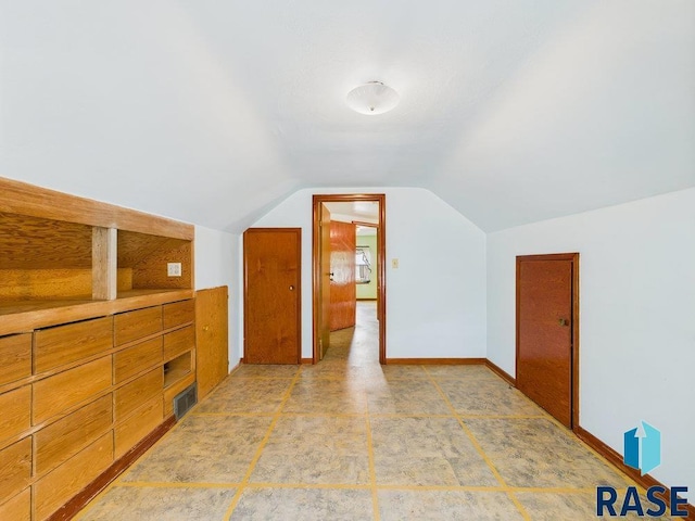 1721 W 11th St, Sioux Falls, SD 57104 - additional living space featuring lofted ceiling and baseboards