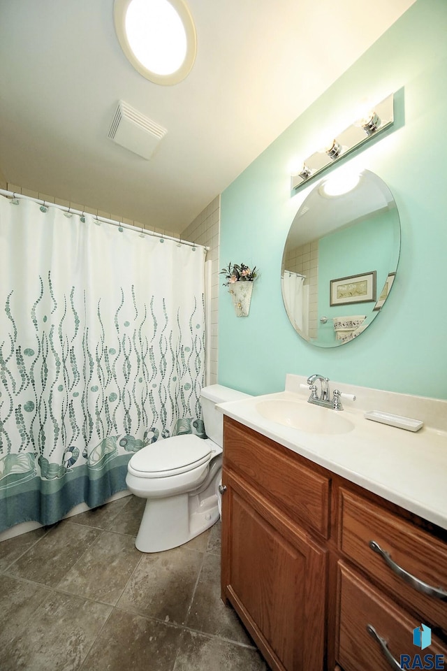 429 S Elm St, Lennox, SD 57039 - full bathroom featuring vanity and toilet