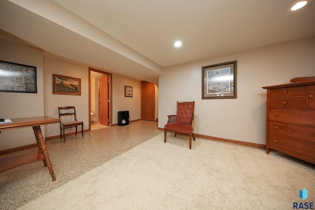 429 S Elm St, Lennox, SD 57039 - living area with recessed lighting, arched walkways, and dark speckled floor