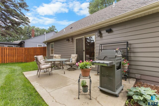 2424 S Main Ave, Sioux Falls, SD 57105 - view of patio / terrace with grilling area and outdoor dining space