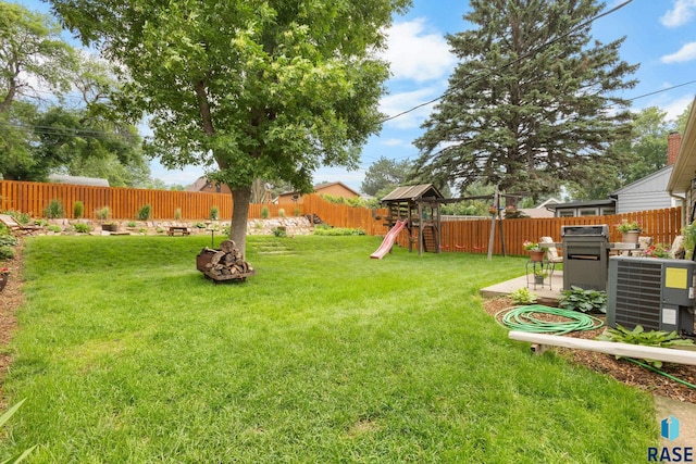 2424 S Main Ave, Sioux Falls, SD 57105 - fenced backyard featuring a playground