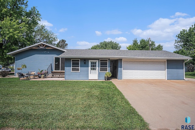 300 W 3rd St, Tea, SD 57064 - view of front of home with a front yard, a garage, concrete driveway, and a shingled roof