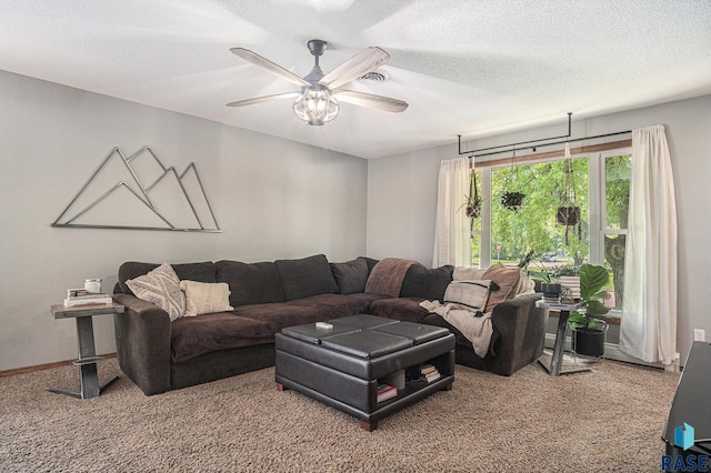 300 W 3rd St, Tea, SD 57064 - carpeted living area with a ceiling fan and a textured ceiling