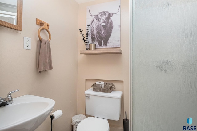 300 W 3rd St, Tea, SD 57064 - bathroom featuring a sink and an enclosed shower