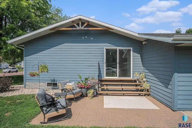 300 W 3rd St, Tea, SD 57064 - back of property with entry steps and a patio
