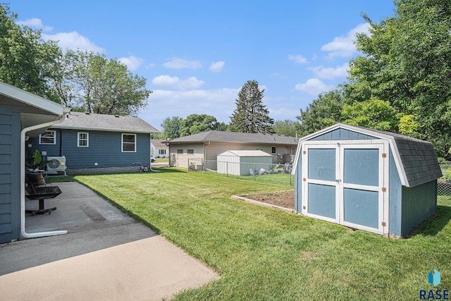 300 W 3rd St, Tea, SD 57064 - view of green lawn with a shed