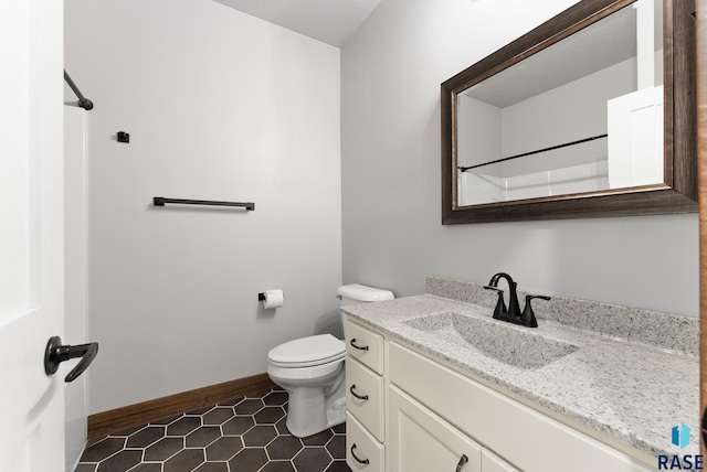 116 Lynx St, Valley Springs, SD 57068 - bathroom featuring vanity, tile patterned flooring, and a shower