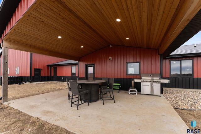 25953 481st Ave, Brandon, SD 57005 - view of patio / terrace with area for grilling and outdoor dining area