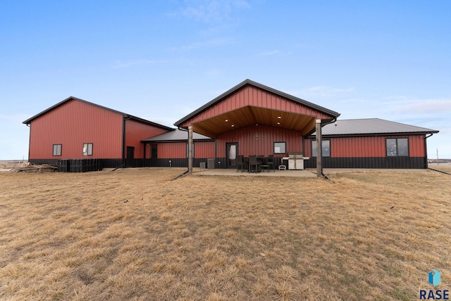 25953 481st Ave, Brandon, SD 57005 - rear view of house featuring a patio area