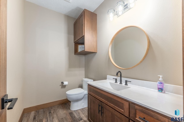 25953 481st Ave, Brandon, SD 57005 - bathroom with wood finished floors and vanity