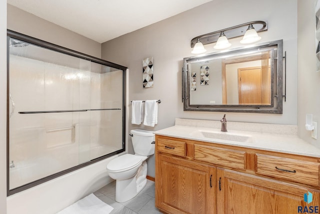 4808 S Shields Ave, Sioux Falls, SD 57103 - bathroom with vanity, shower / bath combination with glass door, and tile patterned flooring