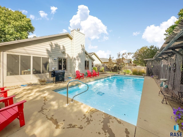 4808 S Shields Ave, Sioux Falls, SD 57103 - view of pool with a fenced backyard, a patio area, and a grill