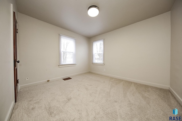 1330 W 14th St, Sioux Falls, SD 57104 - carpeted spare room with baseboards