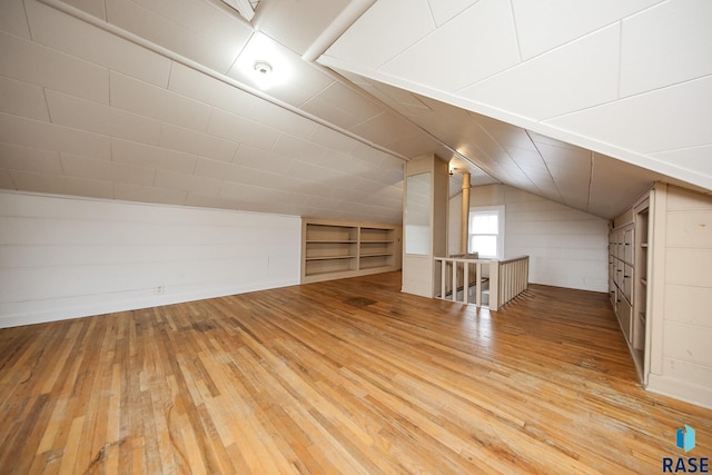 1330 W 14th St, Sioux Falls, SD 57104 - bonus room featuring wood-type flooring and lofted ceiling