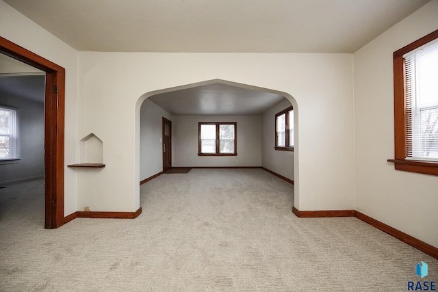 1330 W 14th St, Sioux Falls, SD 57104 - unfurnished room with arched walkways and carpet floors