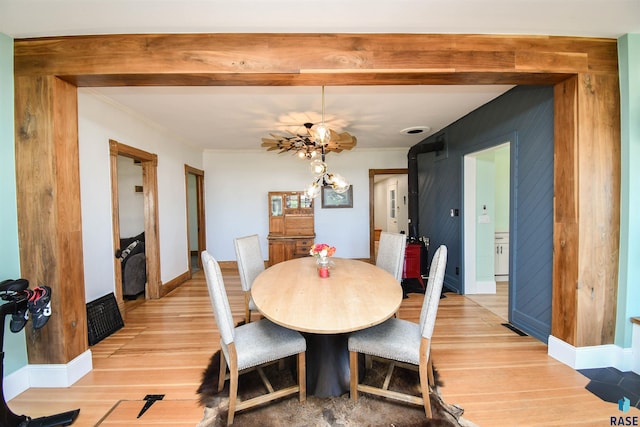 47138 293rd St, Beresford, SD 57004 - dining room with light wood-style flooring and ornamental molding