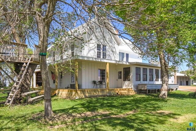 47138 293rd St, Beresford, SD 57004 - rear view of property with a lawn
