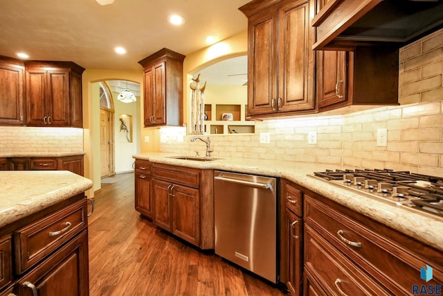 6811 E Split Rock Cir, Sioux Falls, SD 57110 - kitchen featuring dishwasher, arched walkways, extractor fan, tasteful backsplash, and recessed lighting