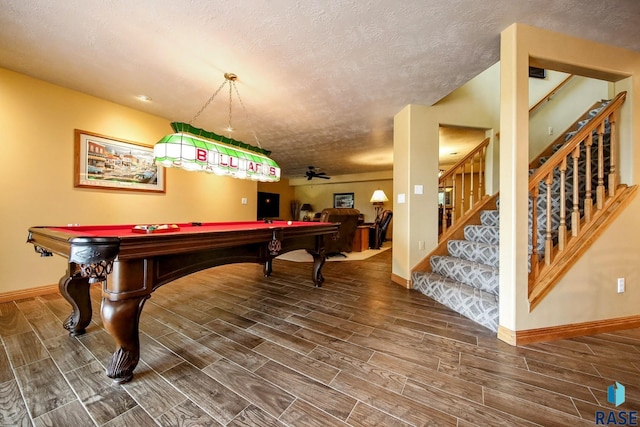 6811 E Split Rock Cir, Sioux Falls, SD 57110 - recreation room with wood finish floors, billiards table, ceiling fan, and a textured ceiling