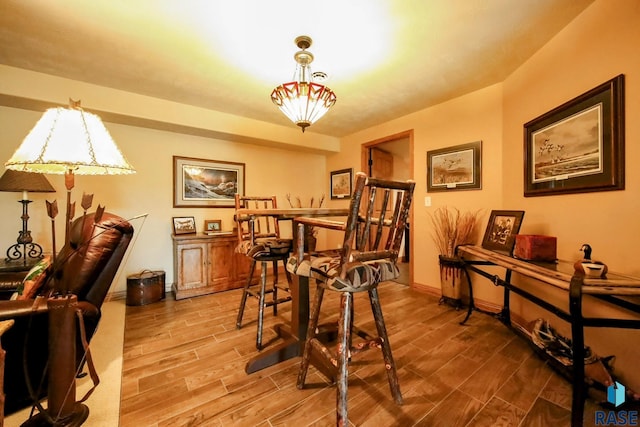 6811 E Split Rock Cir, Sioux Falls, SD 57110 - dining space featuring wood finished floors and baseboards